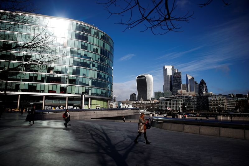 &copy; Reuters. FILE PHOTO: The City of London financial district can be seen, whilst British stocks tumble as investors fear that the coronavirus outbreak could stall the global economy, in London, Britain, March 9 2020. REUTERS/Henry Nicholls/File Photo