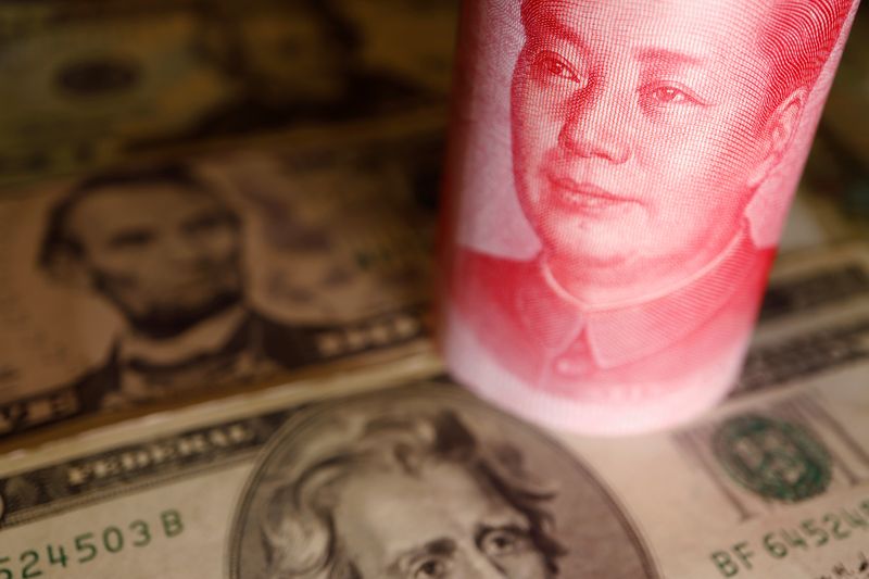 &copy; Reuters. FILE PHOTO: U.S. Dollar and Chinese Yuan banknotes are seen in this illustration picture taken June 14, 2022. REUTERS/Florence Lo/Illustration/File Photo