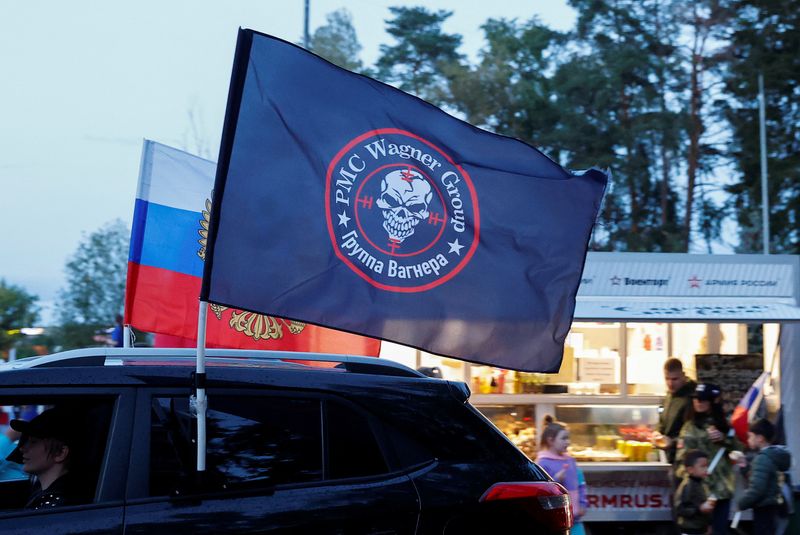 &copy; Reuters. A flag with the logo of Wagner private mercenary group is attached to a car during an automobile rally at a patriotic festival marking Russia's National Flag Day in the Moscow region, Russia, August 23, 2023. REUTERS/Yulia Morozova/File Photo
