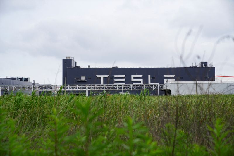 &copy; Reuters. A view of a Tesla sign at its factory in Shanghai, China June 12, 2023. REUTERS/Aly Song/File Photo