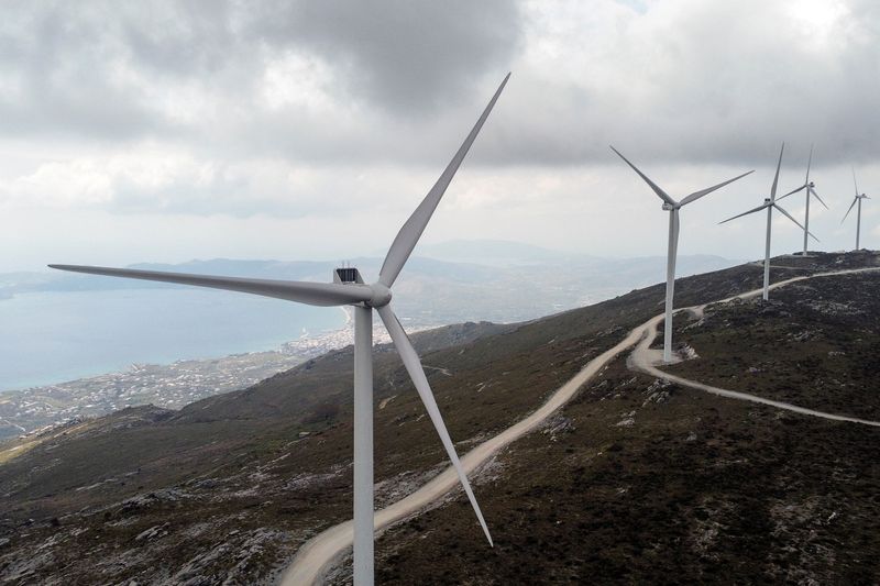 &copy; Reuters. FILE PHOTO: Wind turbines are seen on a mountain near the town of Karystos, on the island of Evia, Greece, April 16, 2021. Picture taken with a drone on April 16, 2021. REUTERS/Alkis Konstantinidis/File Photo