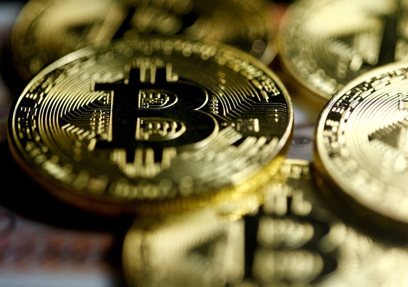 &copy; Reuters. FILE PHOTO: Bitcoins are seen in this illustration picture taken September 27, 2017. REUTERS/Dado Ruvic/Illustration//File Photo