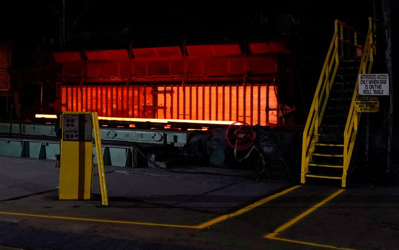 &copy; Reuters. FILE PHOTO: A steel furnace glows with heat as it operates at the Granite City Works hot strip steel mill in Granite City, Illinois, U.S., July 26, 2018. REUTERS/Joshua Roberts/File Photo