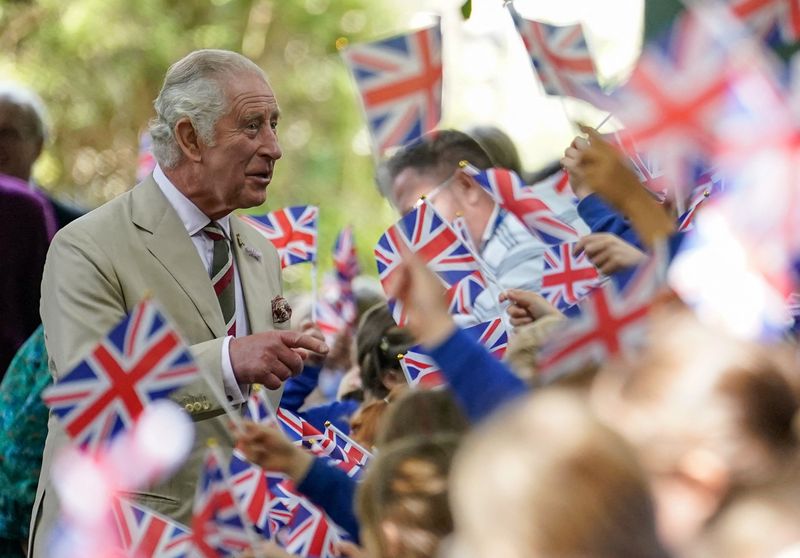 &copy; Reuters. FILE PHOTO: Britain's King Charles meets local school children as he arrives at Brecon Cathedral, to mark the centenary year of the cathedral and to meet cathedral representatives and organisers of the Brecon Choir Festival, in Brecon, Wales, Britain, Jul