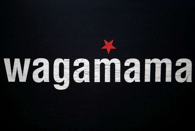 &copy; Reuters. FILE PHOTO: A sign of Wagamama restaurant is seen in London, Britain, October 5, 2020. REUTERS/Hannah McKay/File Photo