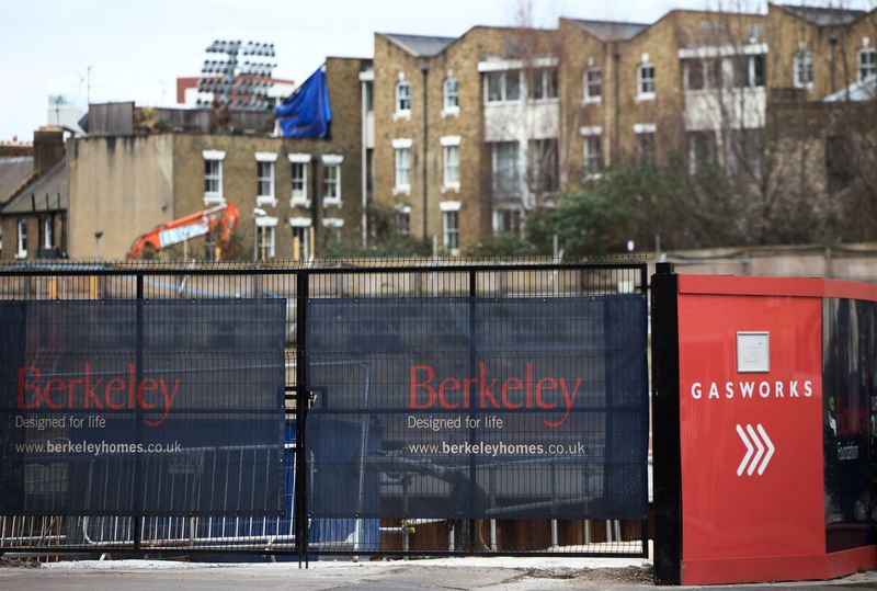 &copy; Reuters. FILE PHOTO: Hoardings display a logo of Berkeley Group outside a development in London, Britain, March 4, 2023. REUTERS/Henry Nicholls/File Photo