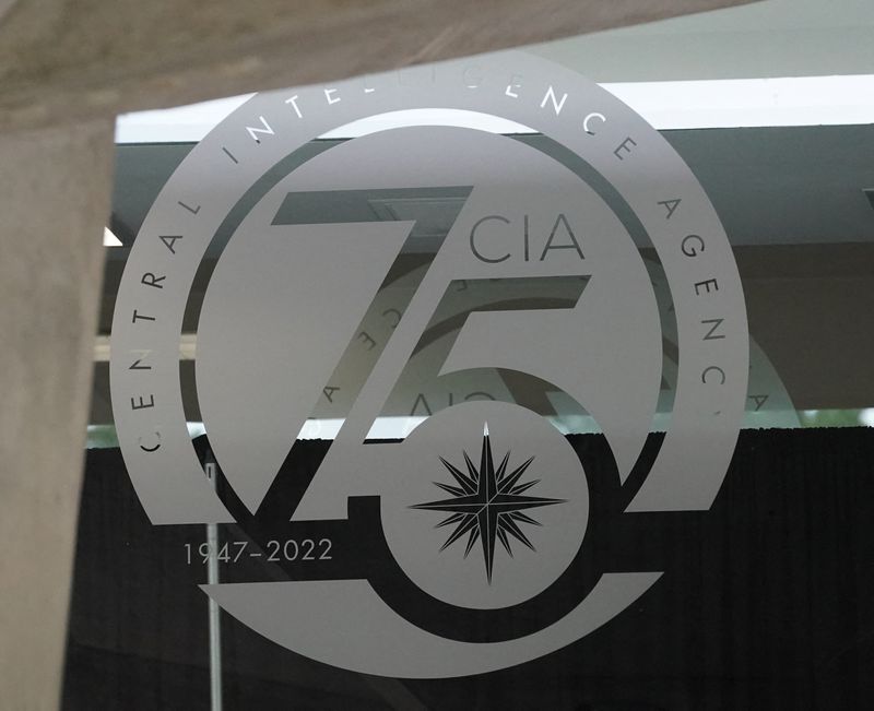 &copy; Reuters. A glass door bears a commemorative seal marking 75 years at CIA headquarters in Langley, Virginia, U.S., July 8, 2022. REUTERS/Kevin Lamarque/File Photo