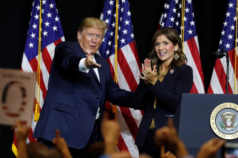 &copy; Reuters. FILE PHOTO: U.S. President Donald Trump brings gubernatorial candidate Kristi Noem on stage during a Republican Party fundraiser in Sioux Falls, South Dakota, U.S., September 7, 2018. REUTERS/Kevin Lamarque