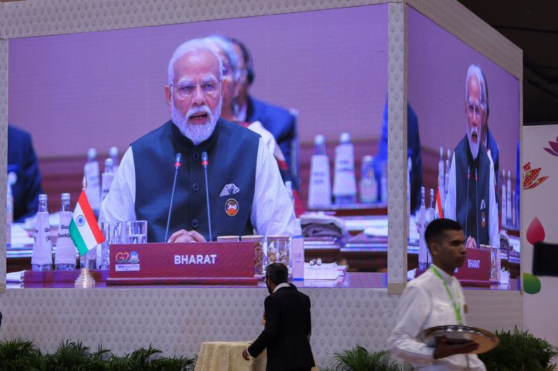&copy; Reuters. شاشة ضخمة تعرض كلمة رئيس الوزراء الهندي ناريندرا مودي في الحلسة الافتتاحية لقمة مجموعة العشرين المنعقدة في نيودلهي يوم السبت. تصوير: أنوشري