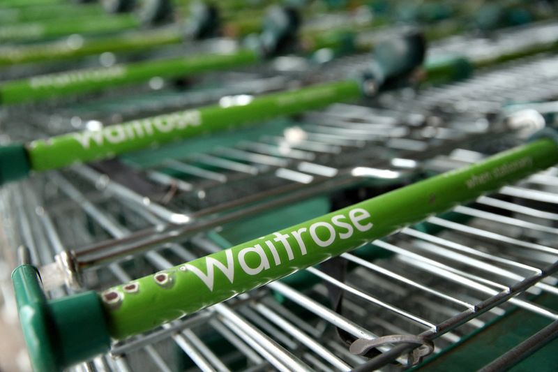 &copy; Reuters. FILE PHOTO: Waitrose trolleys are seen at a store in Harpenden, Britain, March 28, 2020. REUTERS/Peter Cziborra//File Photo