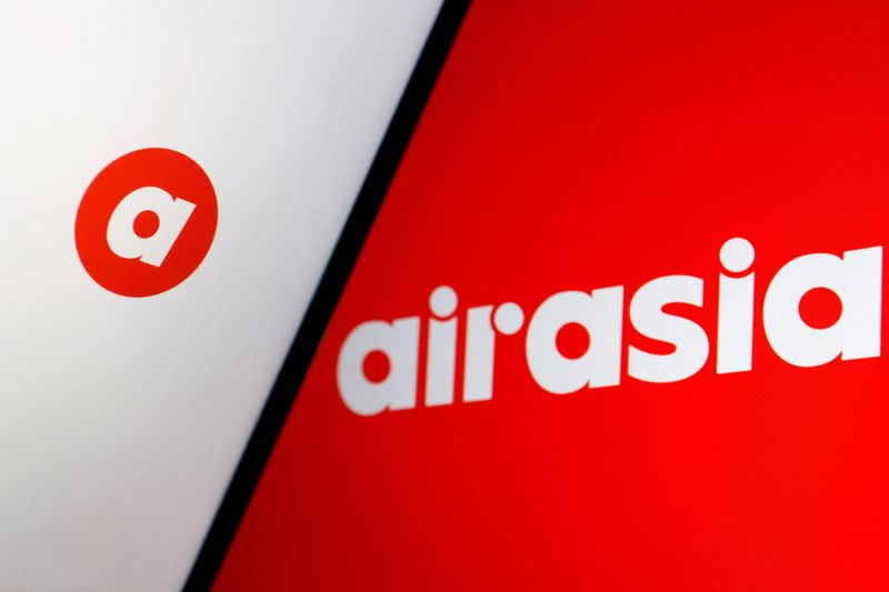 &copy; Reuters. FILE PHOTO: The logo of AirAsia under Capital A is seen displayed in this illustration picture taken March 7, 2022. REUTERS/Florence Lo/Illustration/File Photo