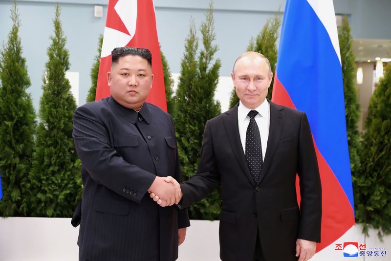 &copy; Reuters. FILE PHOTO: North Korean leader Kim Jong Un shakes hands with Russian President Vladimir Putin in Vladivostok, Russia in this undated photo released on April 25, 2019 by North Korea's Central News Agency (KCNA). KCNA via REUTERS    
