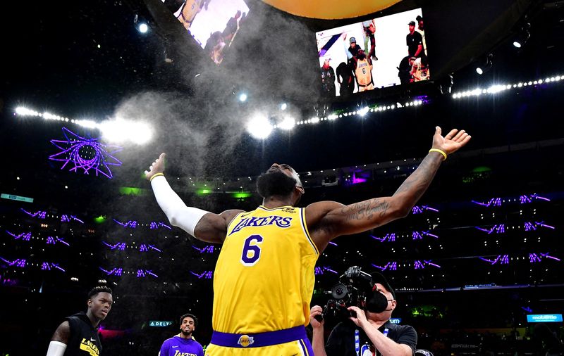 &copy; Reuters. FILE PHOTO: Apr 11, 2023; Los Angeles, California, USA; Los Angeles Lakers forward LeBron James (6) tosses up powder before playing against the Minnesota Timberwolves at Crypto.com Arena. Mandatory Credit: Gary A. Vasquez-USA TODAY Sports/File photo