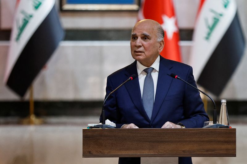 &copy; Reuters. Iraq's Foreign Minister Fuad Hussein speaks with the media after a meeting with Turkey's Foreign Minister Hakan Fidan, in Baghdad, Iraq, August 22, 2023. REUTERS/Thaier Al-Sudani/File photo