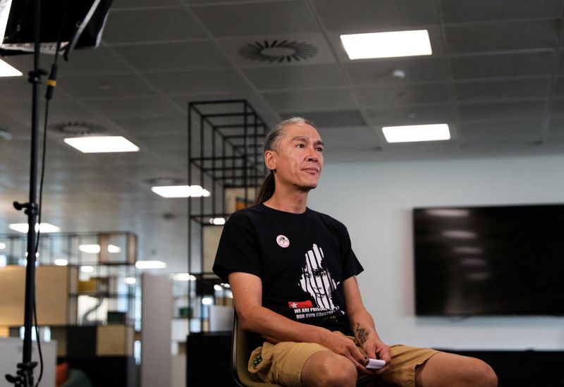 &copy; Reuters. Kim Aris, the son of Myanmar's detained former leader Aung San Suu Kyi, attends an interview at Reuters' office in London, Britain, September 11, 2023. REUTERS/Alishia Abodunde/File photo