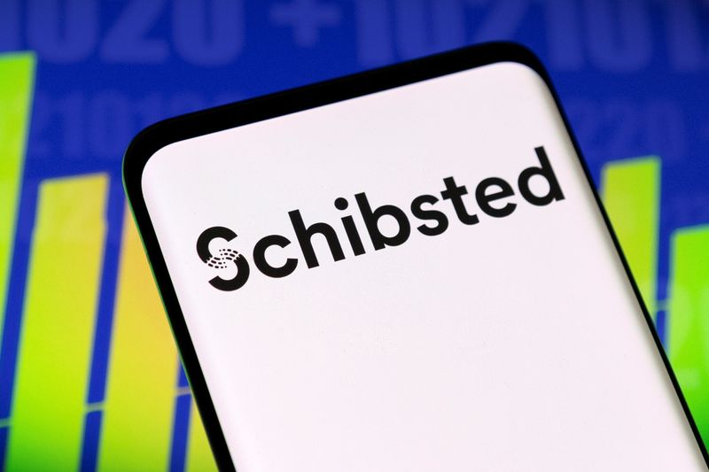 &copy; Reuters. Schibsted logo and stock graph are seen displayed in this illustration taken, May 3, 2022. REUTERS/Dado Ruvic/Illustration/File photo