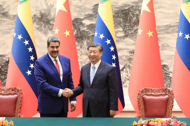 © Reuters. Venezuela's President Nicolas Maduro shakes hands with China's President Xi Jinping, during a meeting at the Great Hall of the People, in Beijing, China September 13, 2023. Miraflores Palace/Handout via REUTERS