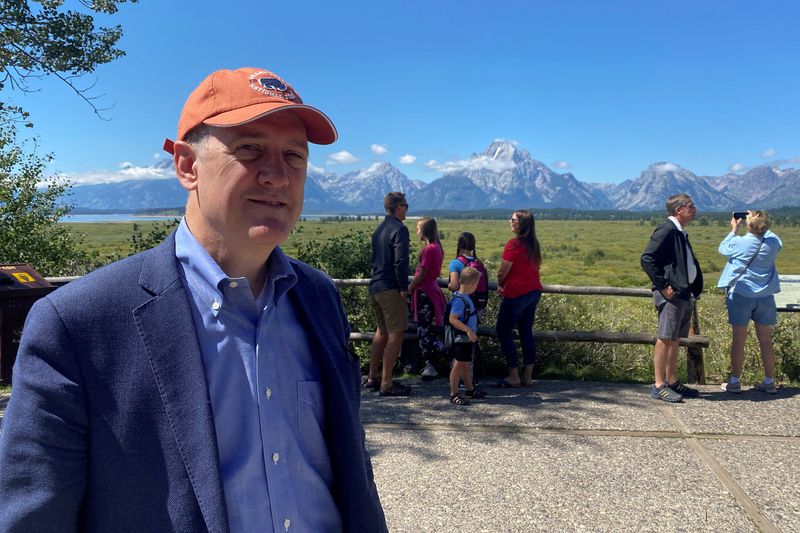 &copy; Reuters. FILE PHOTO: Former St. Louis Federal Reserve President James Bullard stands with his back to the Teton mountain range in Jackson Hole, Wyoming, U.S., August 25, 2022. REUTERS/Ann Saphir/File Photo