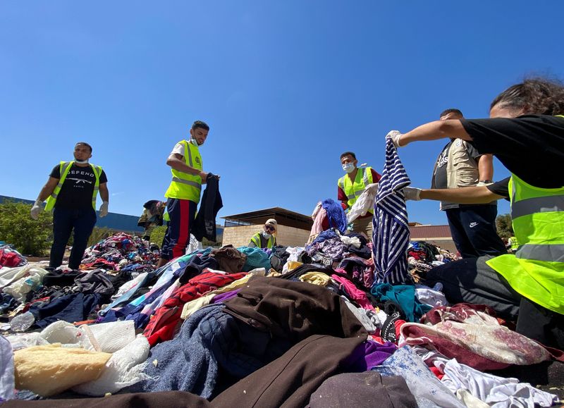 Libyans come together for flood aid effort despite conflict