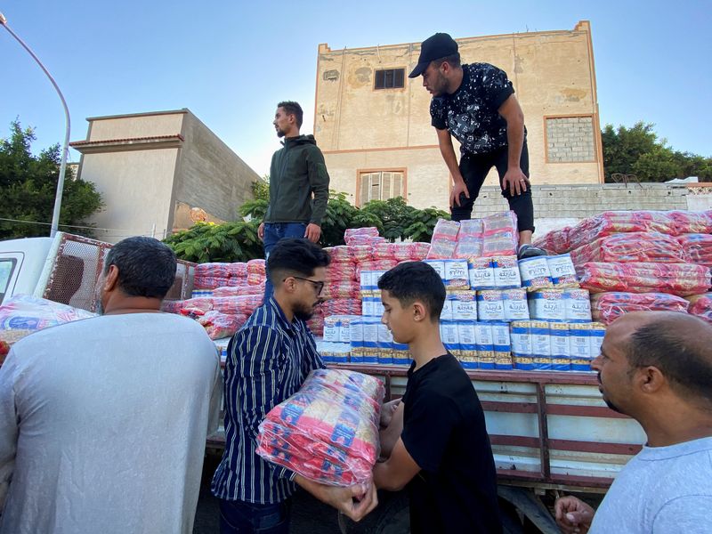 Aid agencies call for end to mass graves after Libya floods