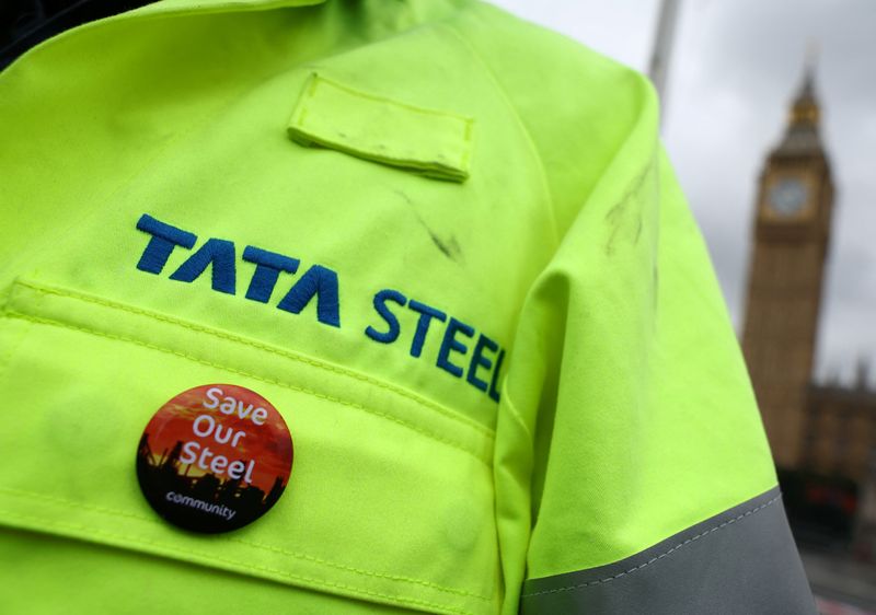&copy; Reuters. A British steel industry worker displays a badge on his Tata Steel work clothing during a protest over jobs, pay and conditions of work, outside of the Houses of Parliament in London, Britain, June 28, 2023. REUTERS/Toby Melville/File photo