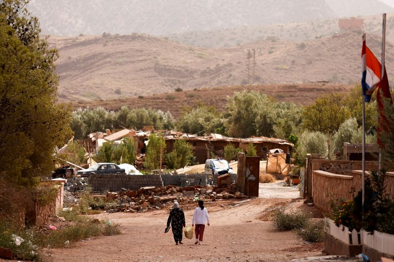 &copy; Reuters. Women walk down a street, in the aftermath of a deadly earthquake in Talat N'Yaaqoub, Morocco September 15, 2023. REUTERS/Ammar Awad