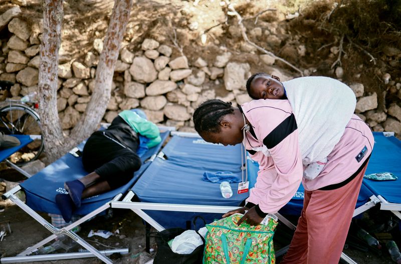 'We want to leave - wherever that might be,' says Cameroon migrant on Lampedusa