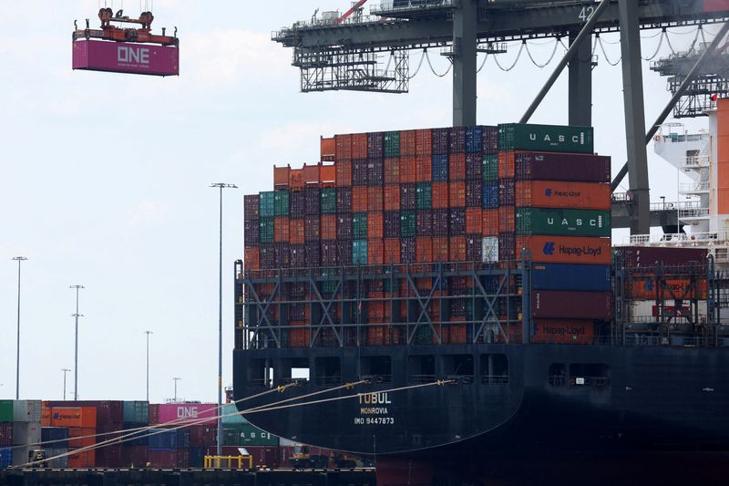 &copy; Reuters. FILE PHOTO: A docked cargo ship is loaded with shipping containers at Port Elizabeth, New Jersey, U.S., July 12, 2023. REUTERS/Mike Segar/File Photo