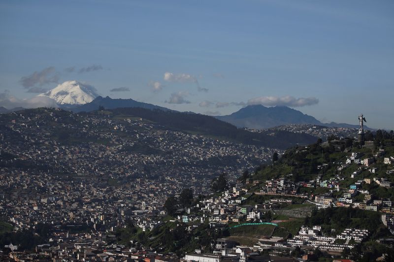 &copy; Reuters. FILE PHOTO: General view of Ecuador's capital city Quito with the Cotopaxi volcano seen in the background, ahead of the second round in country's presidential election, Ecuador April 9, 2021. REUTERS/Luisa Gonzalez/File Photo