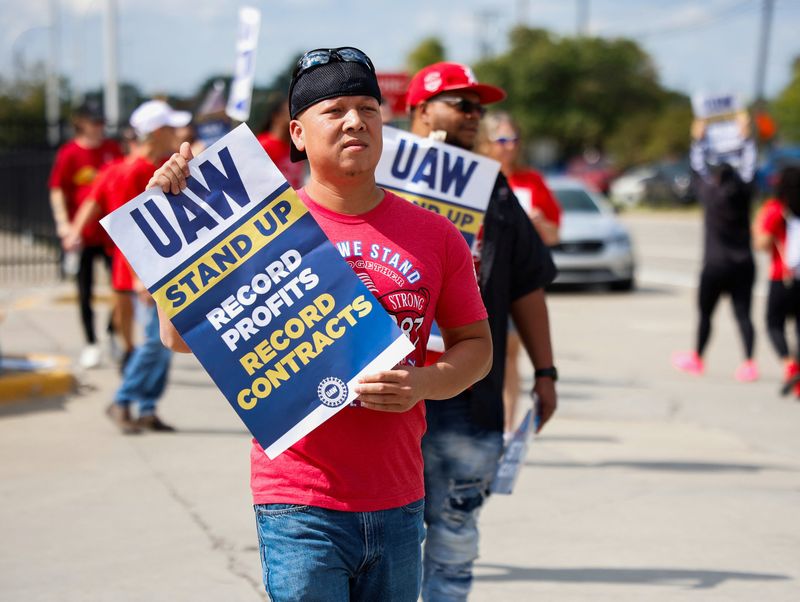UAW cites 'productive' talks with Ford on second day of US auto strike