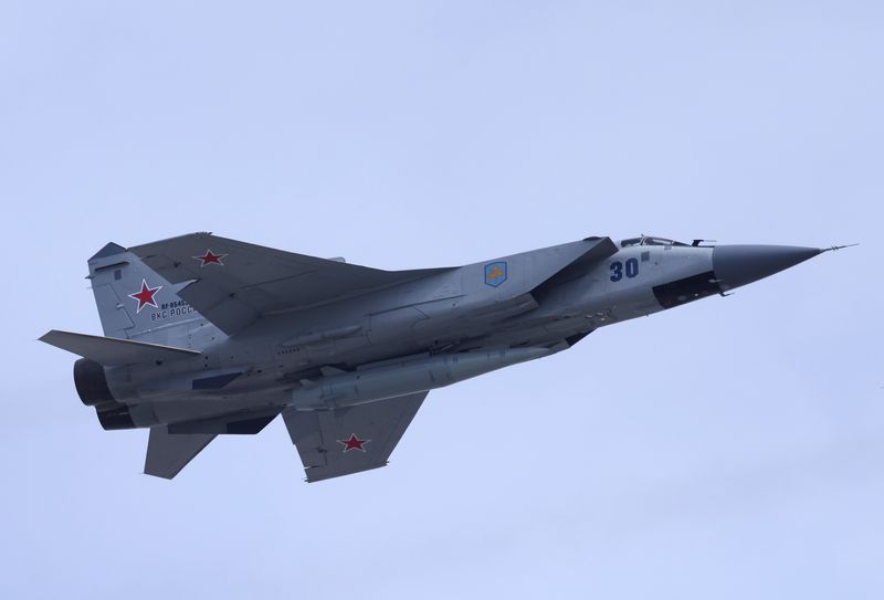 &copy; Reuters. FILE PHOTO: A Russian MiG-31 fighter jet equipped with a Kinzhal hypersonic missile flies over Red Square during a rehearsal for a flypast, part of a military parade marking the anniversary of the victory over Nazi Germany in World War Two, in central Mos