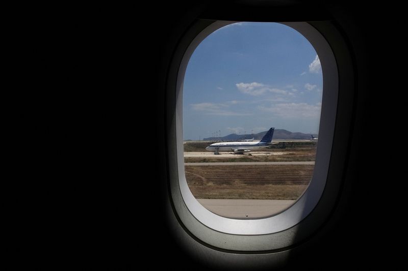 &copy; Reuters. A flight training passenger aircraft is seen through an aircraft window, at the Eleftherios Venizelos International Airport in Athens, Greece, May 17, 2016. REUTERS/Yannis Behrakis/File