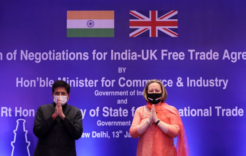 © Reuters. FILE PHOTO: India's Minister of Commerce and Industry, Piyush Goyal, and British Secretary of State for International Trade Anne-Marie Trevelyan pose for a picture during the launch of free trade agreement (FTA) negotiations between the United Kingdom and India during an event at a hotel in New Delhi, India, January 13, 2022. REUTERS/Anushree Fadnavis/File Photo