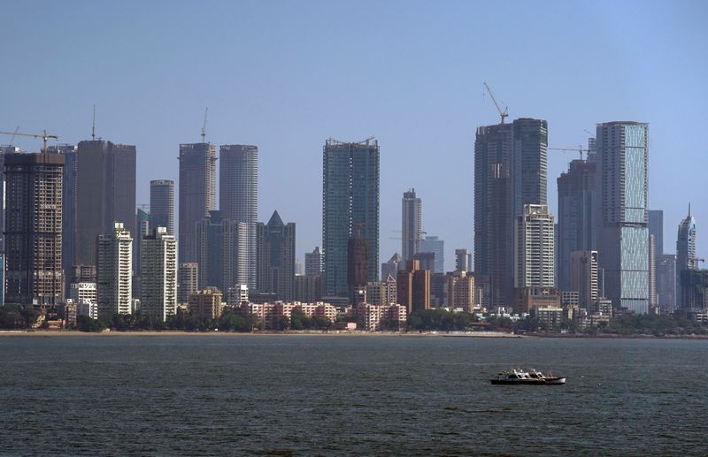 © Reuters. FILE PHOTO: Mumbai's financial district skyline is pictured, after air pollution level started to drop during a nationwide lockdown to slow the spreading of the coronavirus disease (COVID-19), India, April 24, 2020. REUTERS/Hemanshi Kamani/File Photo