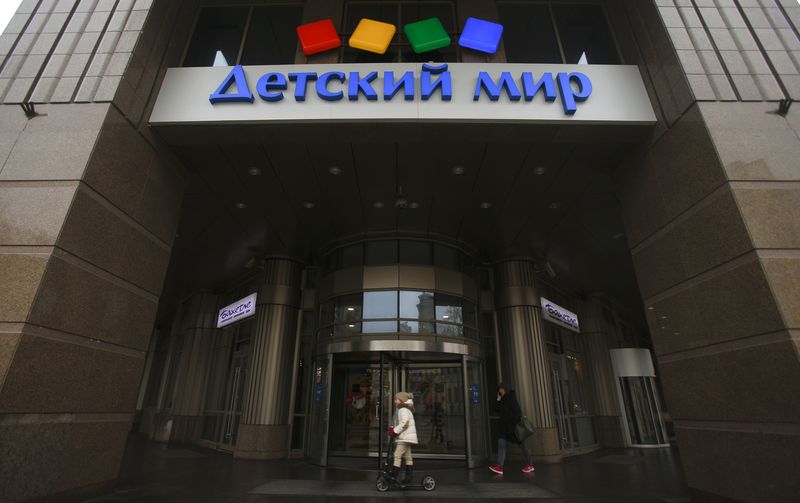 &copy; Reuters. FILE PHOTO: A board, showing the logo of Russian children's goods retailer Detsky Mir, is on display outside its store in Moscow, Russia, February 10, 2017.  REUTERS/Maxim Shemetov