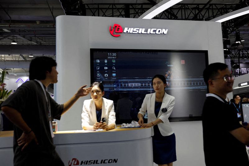 &copy; Reuters. FILE PHOTO: Staff members stand at the booth of Huawei's chip developer Hisilicon, at Security China, an exhibition on public safety and security, in Beijing, China June 7, 2023. REUTERS/Florence Lo/File Photo