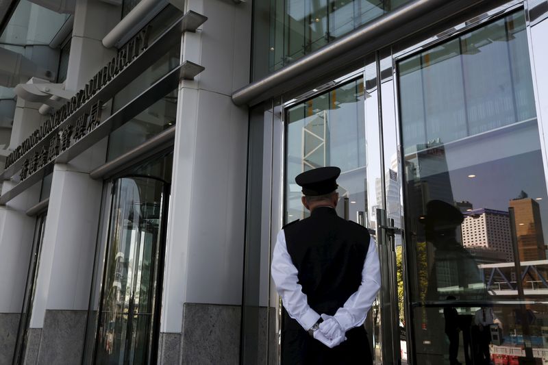 &copy; Reuters. A guard stands in front of the entrance to the Hong Kong Monetary Authority in Hong Kong April 14, 2015. REUTERS/Bobby Yip/File photo