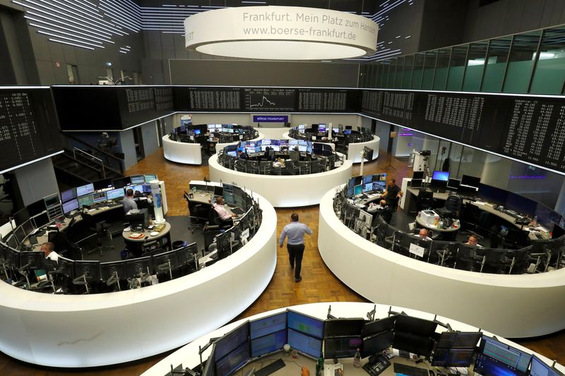 &copy; Reuters. FILE PHOTO: Traders work at Frankfurt's stock exchange in Frankfurt, Germany, October 17, 2019. REUTERS/Ralph Orlowski