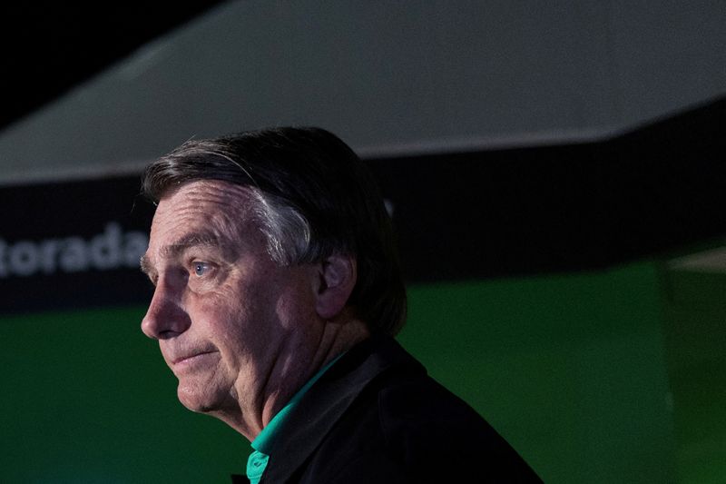 &copy; Reuters. FILE PHOTO: Brazil's former President Jair Bolsonaro talks with media upon his arrival at Brasilia International Airport, Brazil June 30, 2023. REUTERS/Ueslei Marcelino/File Photo