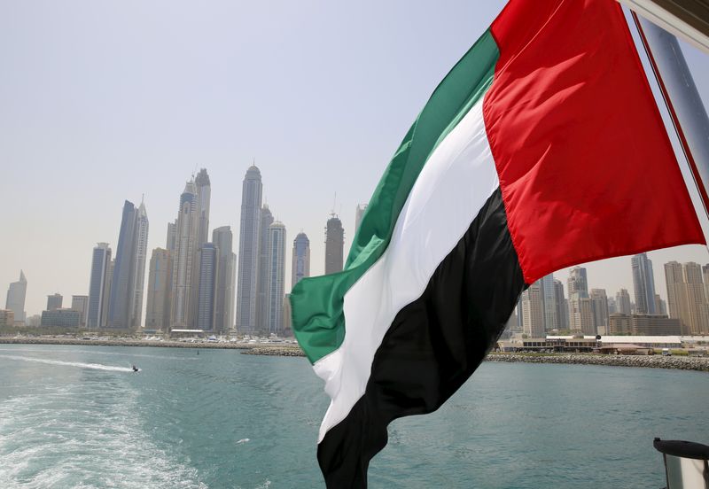 &copy; Reuters. FILE PHOTO: UAE flag flies over a boat at Dubai Marina, Dubai, United Arab Emirates May 22, 2015. REUTERS/Ahmed Jadallah/File Photo