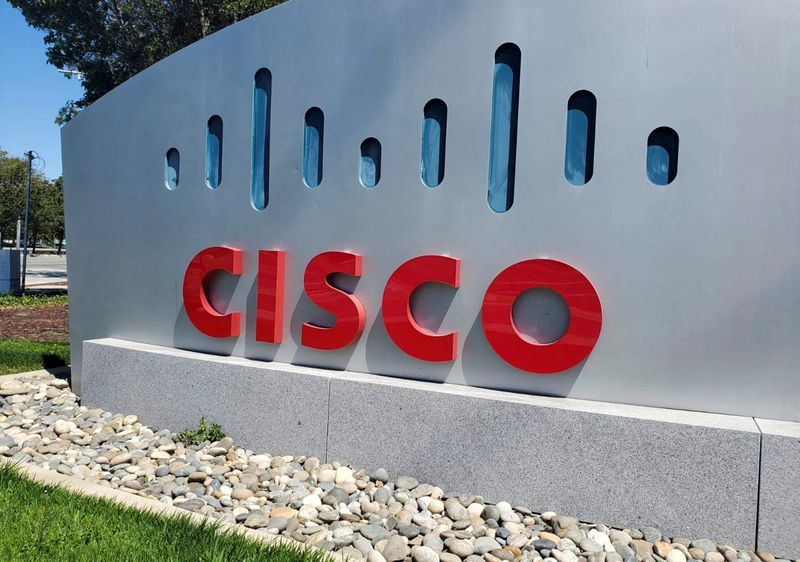 © Reuters. FILE PHOTO: A sign bearing the logo for communications and security tech giant Cisco Systems Inc is seen outside one of its offices in San Jose, California, U.S. August 11, 2022. REUTERS/Paresh Dave/File Photo