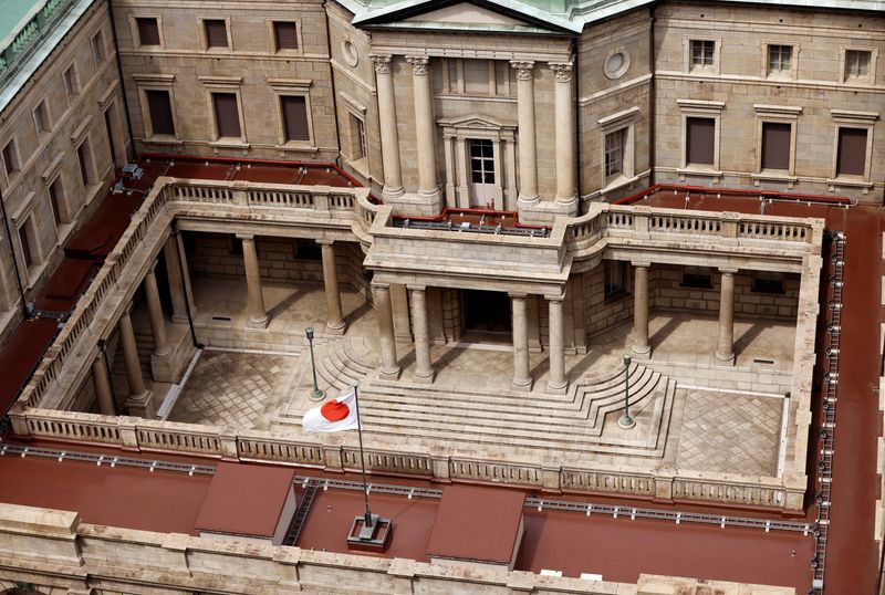 &copy; Reuters. Japanese national flag is hoisted atop the headquarters of Bank of Japan in Tokyo, Japan September 20, 2023.  REUTERS/Issei Kato