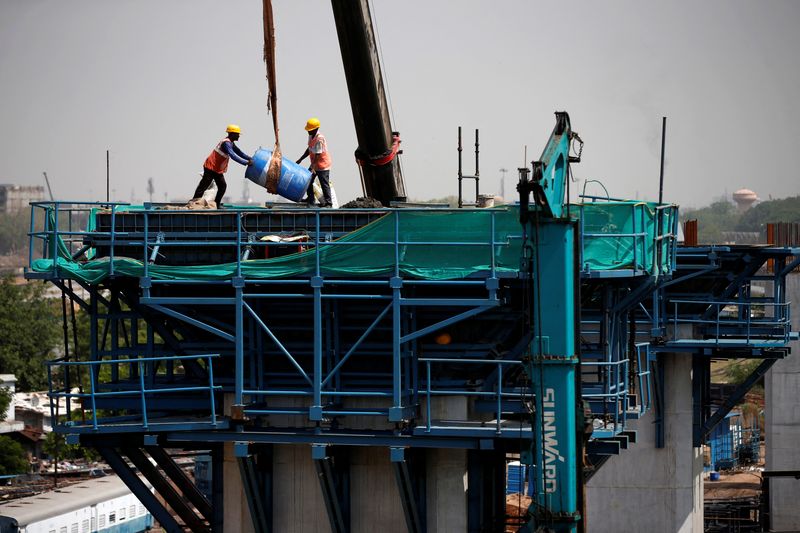 &copy; Reuters. Labourers work at a construction site of the Ahmedabad-Mumbai High Speed Rail corridor in Ahmedabad, India, May 31, 2023. REUTERS/Amit Dave/File photo