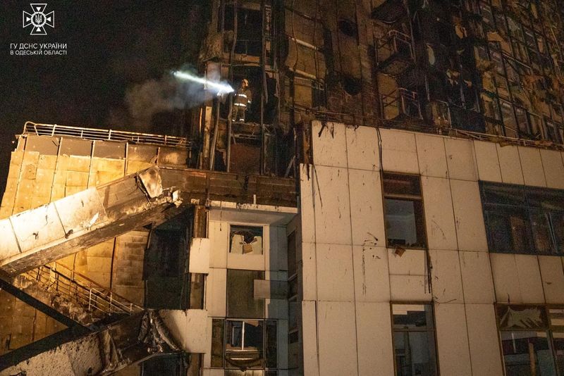 &copy; Reuters. A firefighter works at a site of a hotel damaged by a Russian military attack, amid Russia's attack on Ukraine, in Odesa, Ukraine September 25, 2023. Press service of the State Emergency Service of Ukraine in Odesa region/Handout via REUTERS 