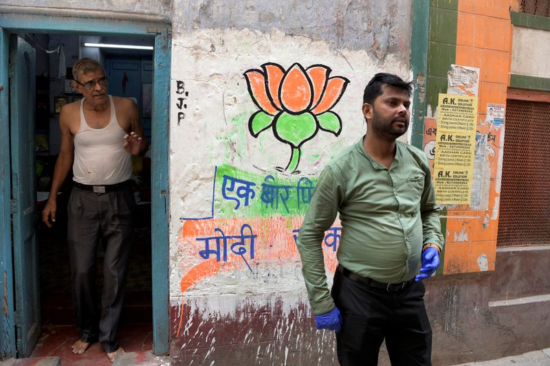 &copy; Reuters. FILE PHOTO-Partha Chaudhury, 39, a worker of India's ruling Bharatiya Janarta Party (BJP), speaks with Reuters during the party's outreach program in Kolkata, India, May 30, 2023. REUTERS/Avijit Ghosh/File Photo