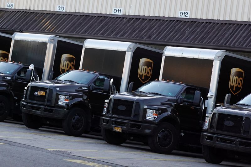 &copy; Reuters. United Parcel Service (UPS) vehicles are seen at a facility in Brooklyn, New York City, U.S., May 9, 2022. REUTERS/Andrew Kelly