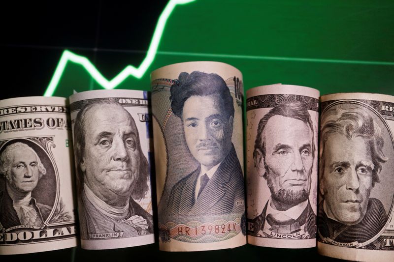 &copy; Reuters. Japanese yen and U.S. dollar banknotes are seen with a currency exchange rate graph in this illustration picture taken June 16, 2022. REUTERS/Florence Lo/Illustration/File photo