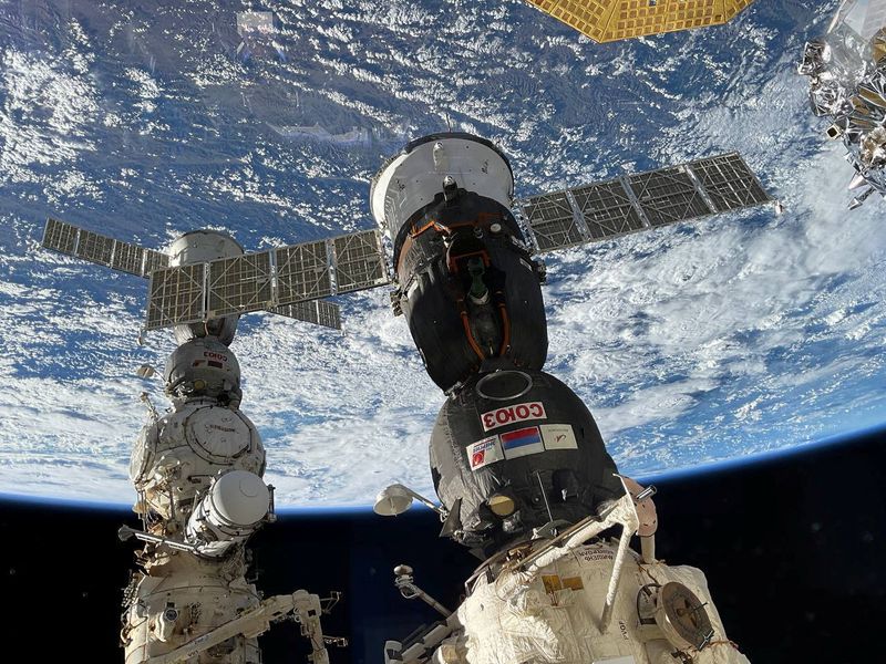 &copy; Reuters. A view shows the Soyuz MS-23 spacecraft (L) carrying Roscosmos cosmonauts Sergey Prokopyev, Dmitry Petelin and NASA astronaut Frank Rubio, who get prepared to leave the International Space Station and head for a parachute-assisted landing on the steppe of