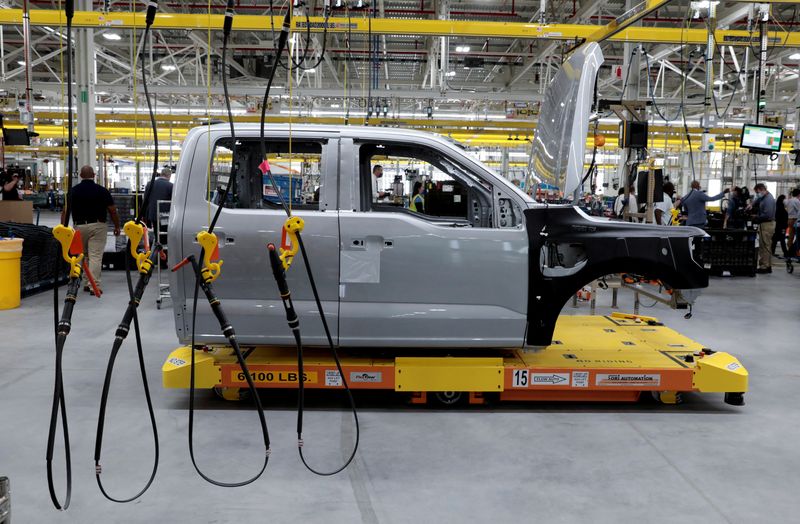 © Reuters. FILE PHOTO: The cab to a Ford all-electric F-150 Lightning truck prototype is seen on an automated guided vehicle (AGV) at the Rouge Electric Vehicle Center in Dearborn, Michigan, U.S. September 16, 2021.   REUTERS/Rebecca Cook/File Photo