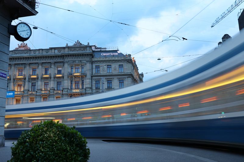 &copy; Reuters. FILE PHOTO: A tram passes outside the headquarters of Credit Suisse before a news conference of Swiss bank UBS in Zurich Switzerland, August 30, 2023. Picture taken with a long exposure. REUTERS/Denis Balibouse/File Photo